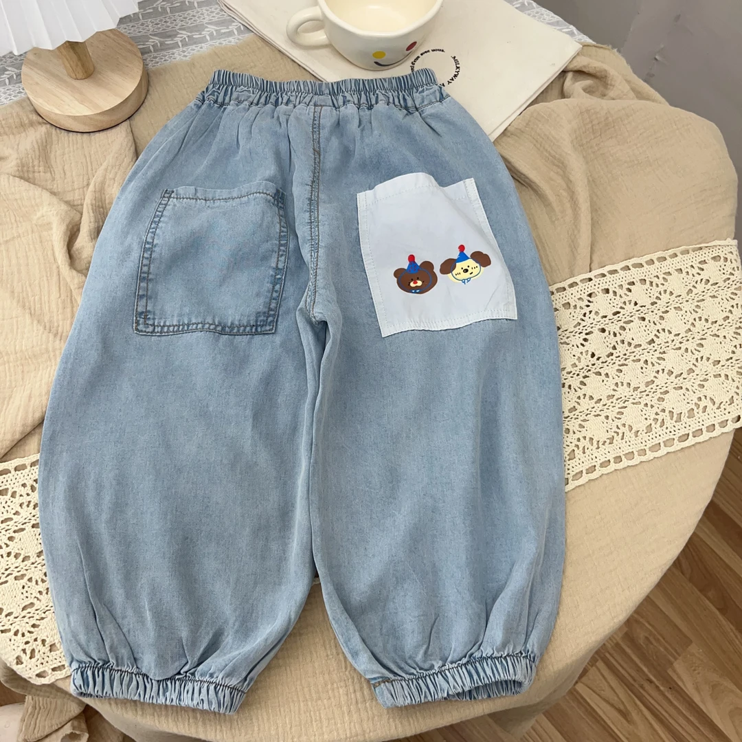 垂感天丝牛仔裤2025儿童中性百搭卡通印花百搭牛仔裤