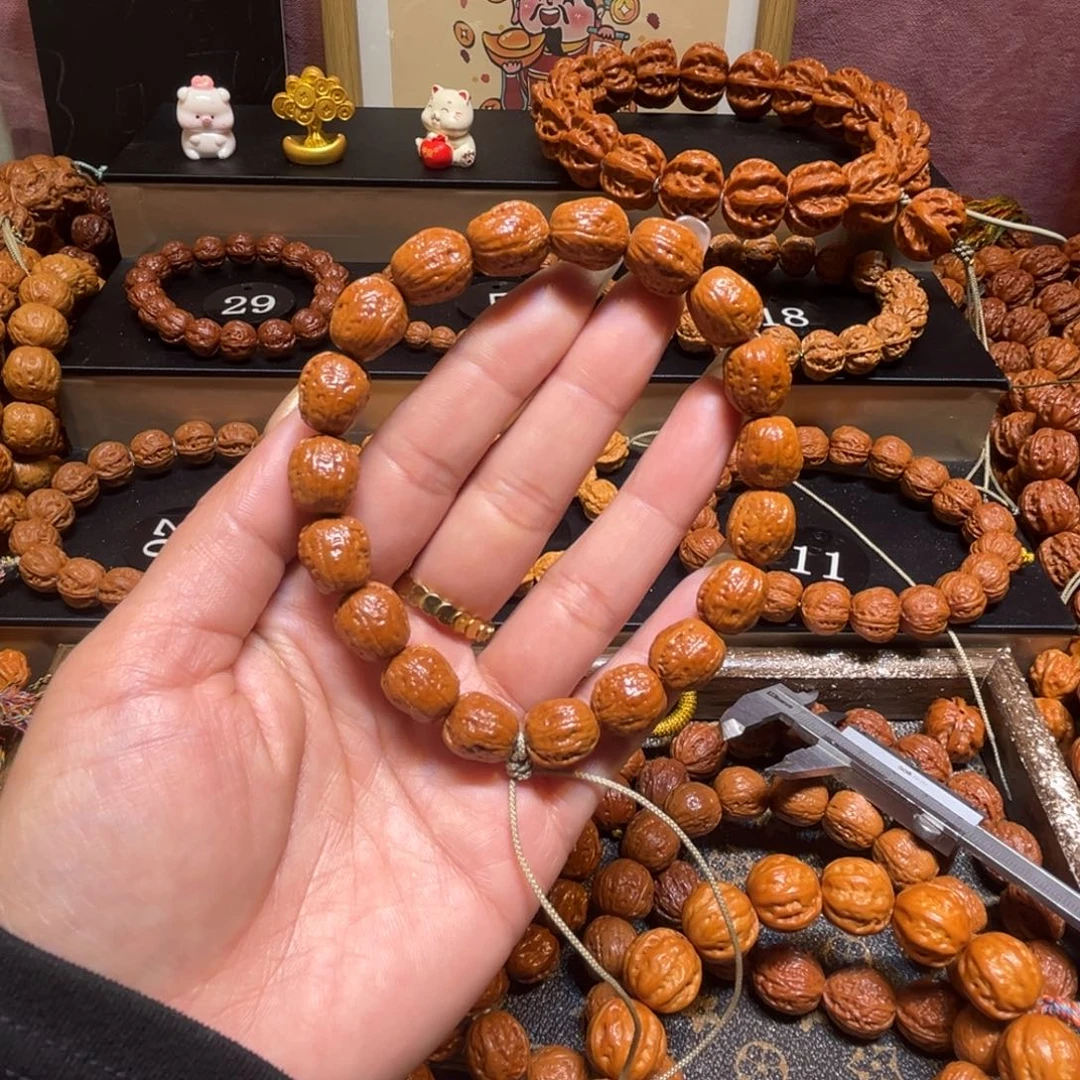 晓***亮手串文玩核桃精品