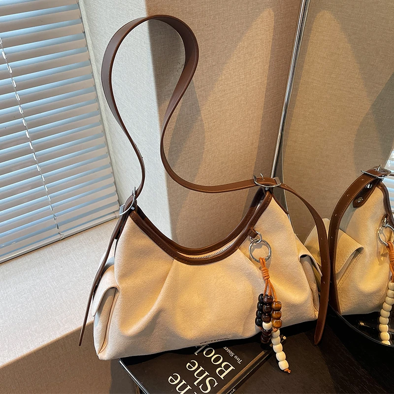 艾米兔女包2025新款小众复古百搭纯色设计简约潮流洋气单肩斜挎包