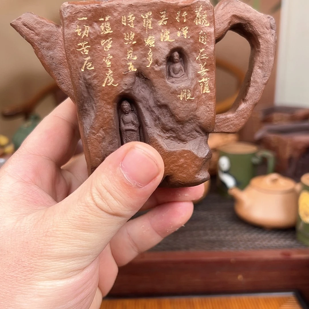 紫砂茶杯石窟车n健康坎坎坷坷