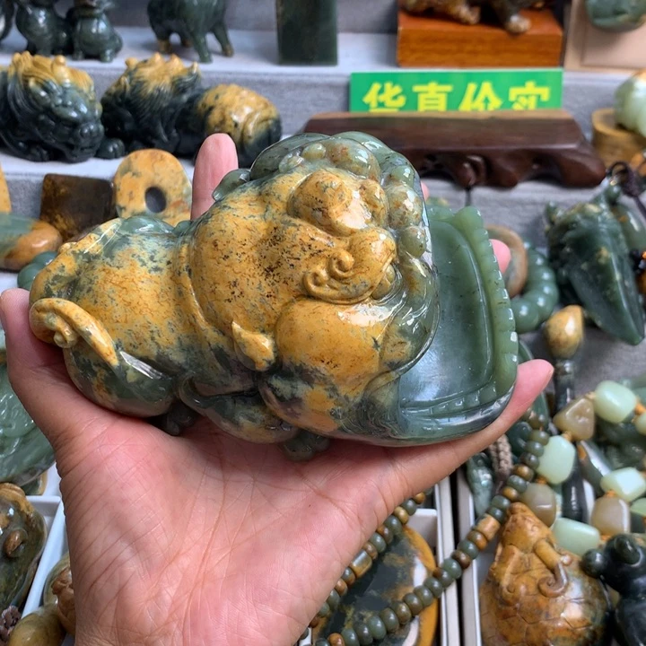 岫岩河磨玉（透闪石质玉）未镶嵌把件火***子