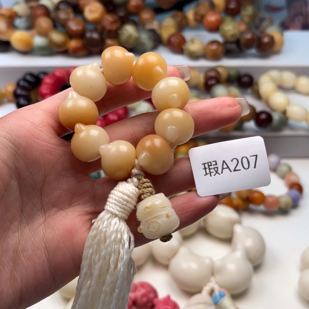 菩提根/象牙果手串15mm瑕猫头手捻一串a207