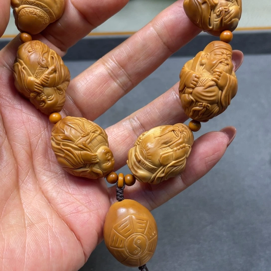 橄榄核手串/手链上**眼橄榄核雕工艺