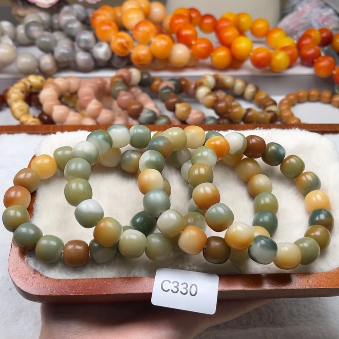 菩提根/象牙果手串通货wc330桶珠随机一串13nm