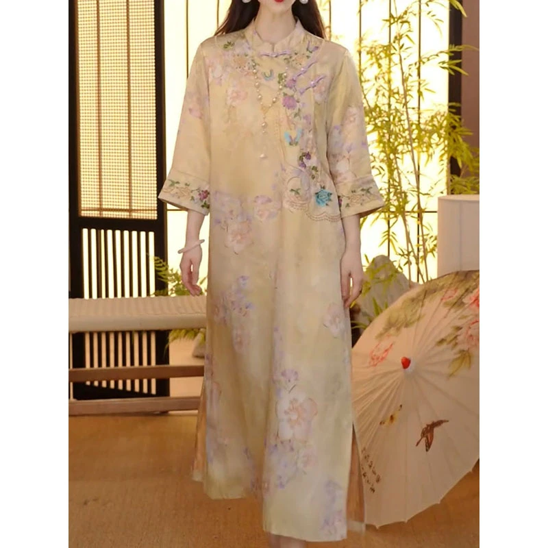 小众文艺风盘扣立领国风连衣裙2025夏装新款轻奢印花七分袖A字裙