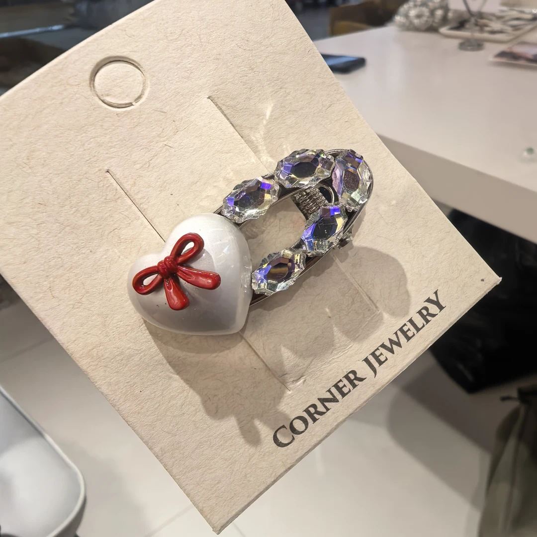 F167红色蝴蝶结爱心闪闪边夹