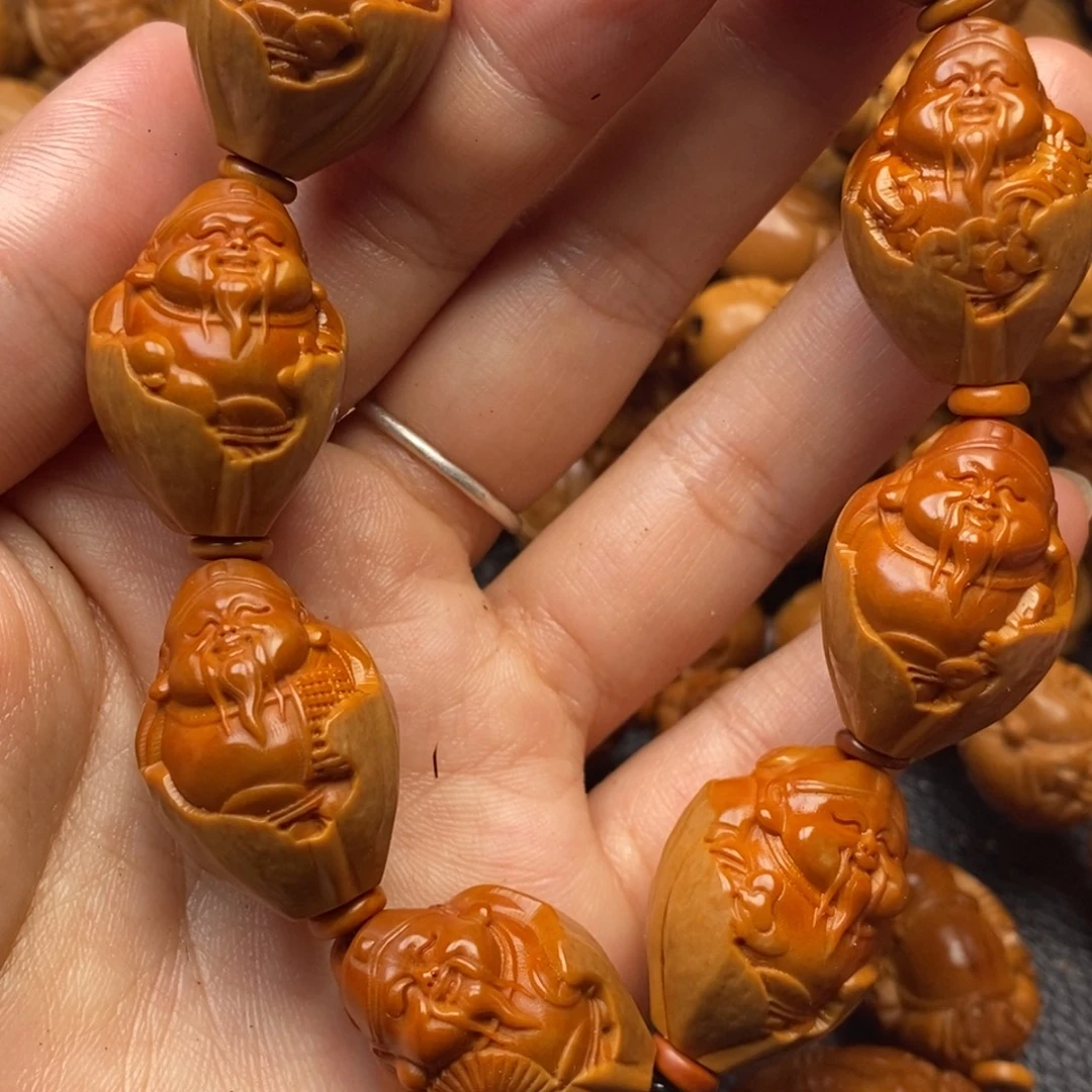 祥***哥手串橄榄核包衣财神