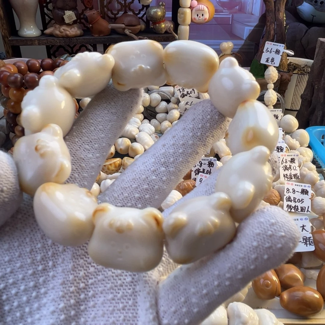 菩提根/象牙果手串-微烤色叮当猫