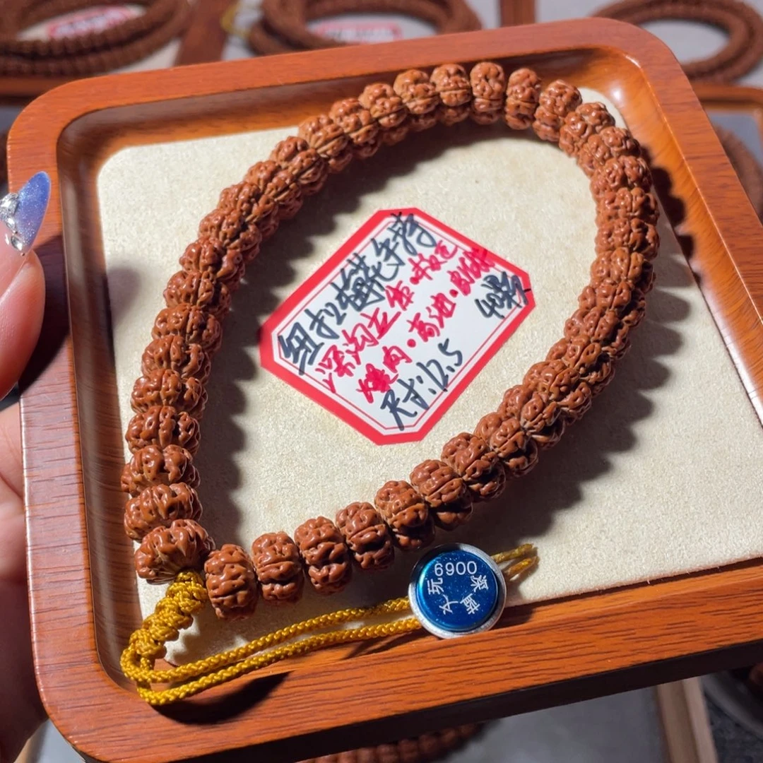 李***信吊坠金刚菩提纽扣梅花手持12+