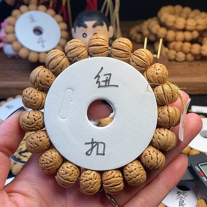 桃核手串鳕*堡纽扣16.5s （尺寸误差0.5之间）