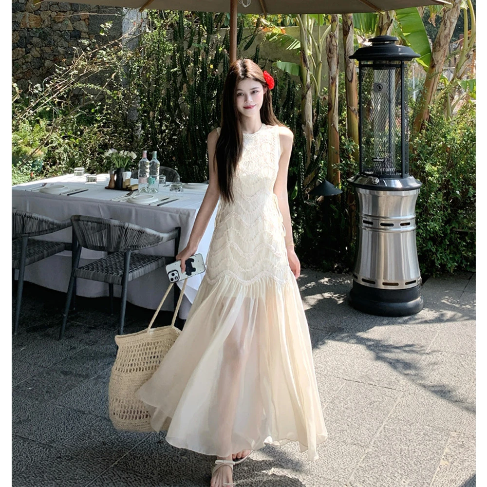 高级感蕾丝度假风连衣裙女2025新款独特超好看小众设计无袖长裙子