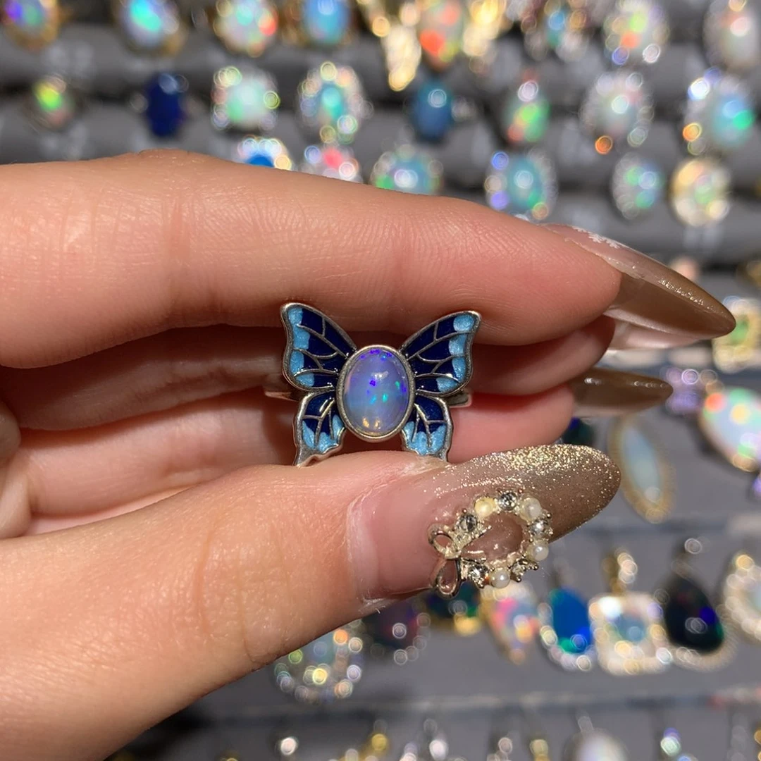 欧泊K福利戒指银S925镶嵌凉*?