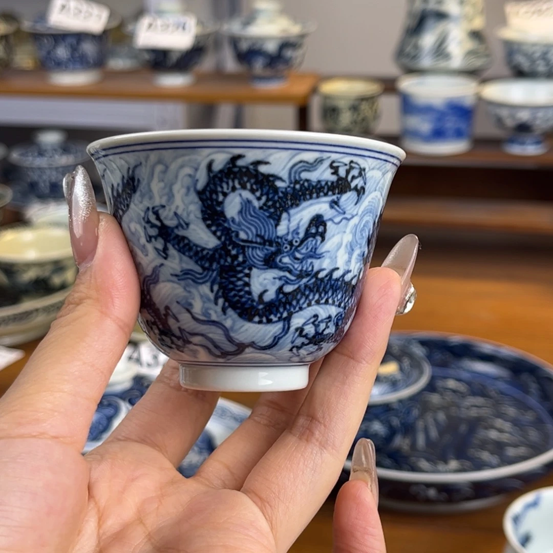 山***中换淡描海水龙纹铃铛杯