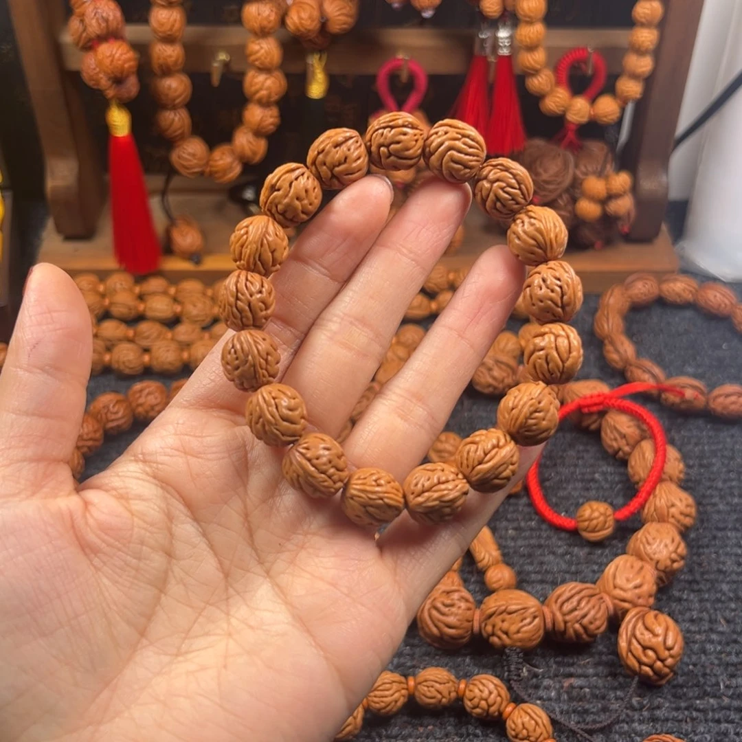 吊坠桃核桃枭手串L1