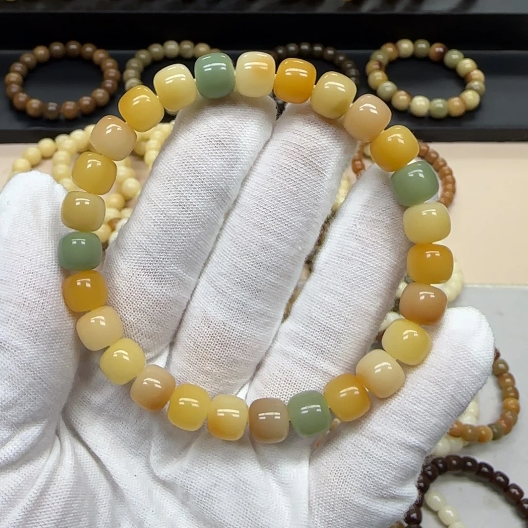 菩提根/象牙果手串8*9 花皮多宝 5年