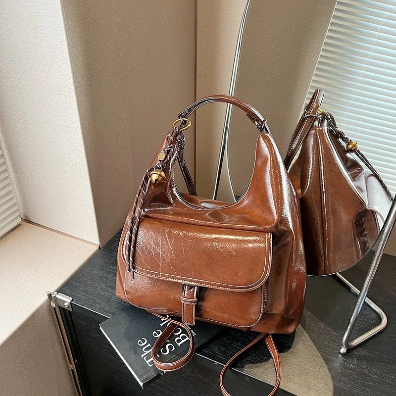 时尚上班通勤托特包新款休闲单肩包简约潮流外出洋气多用途双肩包