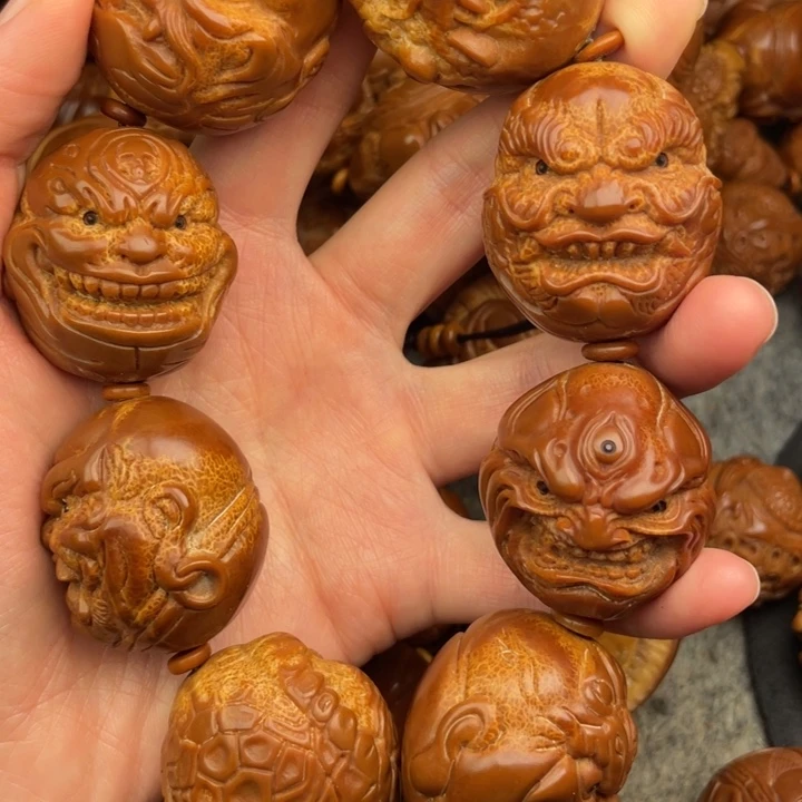 莫***石橄榄核吊坠橄榄核