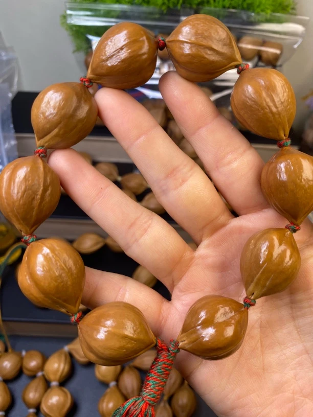 橄榄核雕2.2梅林铁鸡血红10