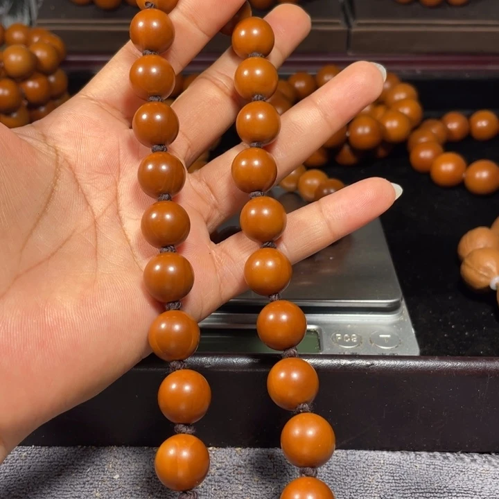 橄榄核吊坠1.34+树王手持27颗