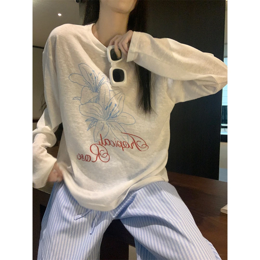 韩系甜妹宽松白色罩衫长袖t恤女春夏印花设计慵懒百搭防晒衫上衣