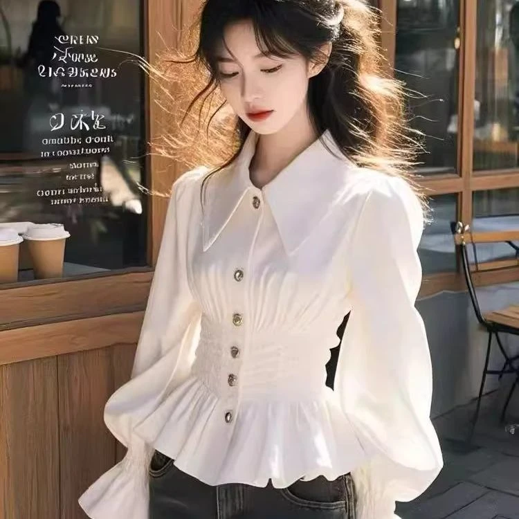 白色长袖衬衫女款春秋季2025新款修身收腰上衣灯笼袖时尚别致衬衣