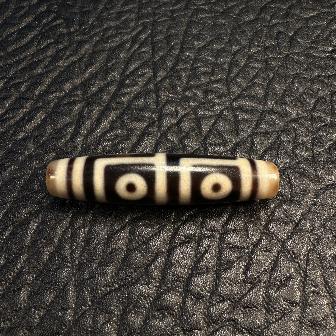 20世纪牙黄地 门四眼玛瑙珠 珠12.6mmx56mm/777-44