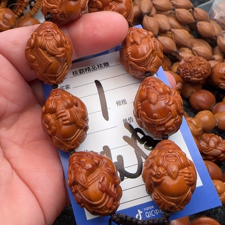 橄榄核手串行****扬橄榄核雕工艺手串