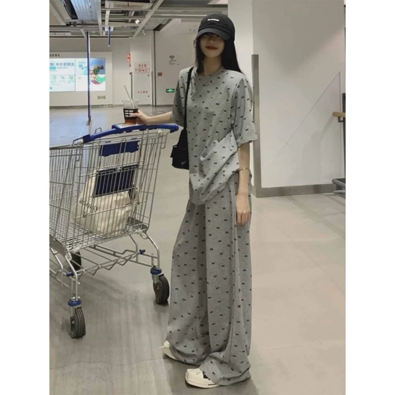 慵懒风休闲运动套装夏季女时尚宽松显瘦蝴蝶结印短袖阔腿裤两件套