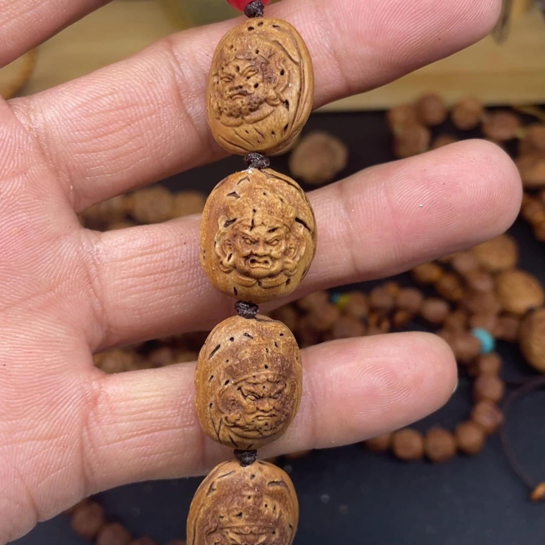 文***玩桃核雕刻四大天王手捻