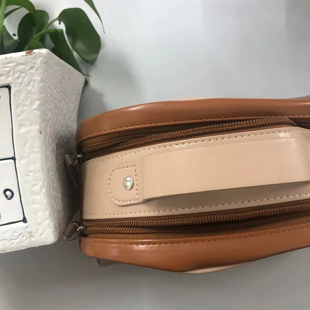 小CE啊~棕色收纳包包