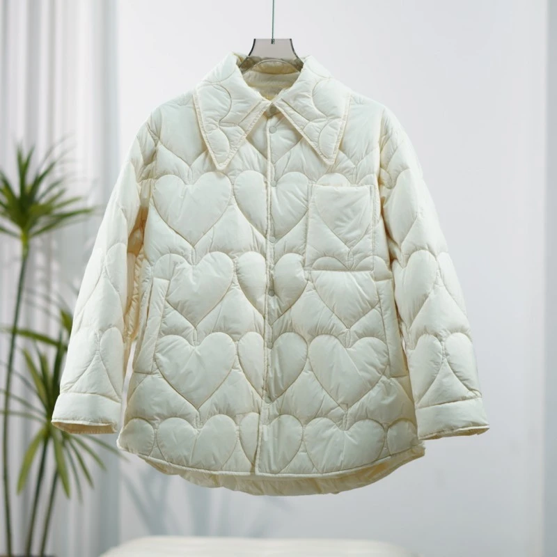 江N系列  F140   女装时尚撤柜秋冬羽绒服米白色