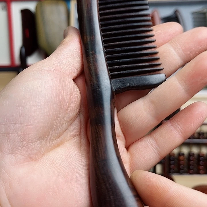 红酸枝木类乌木插齿梳子