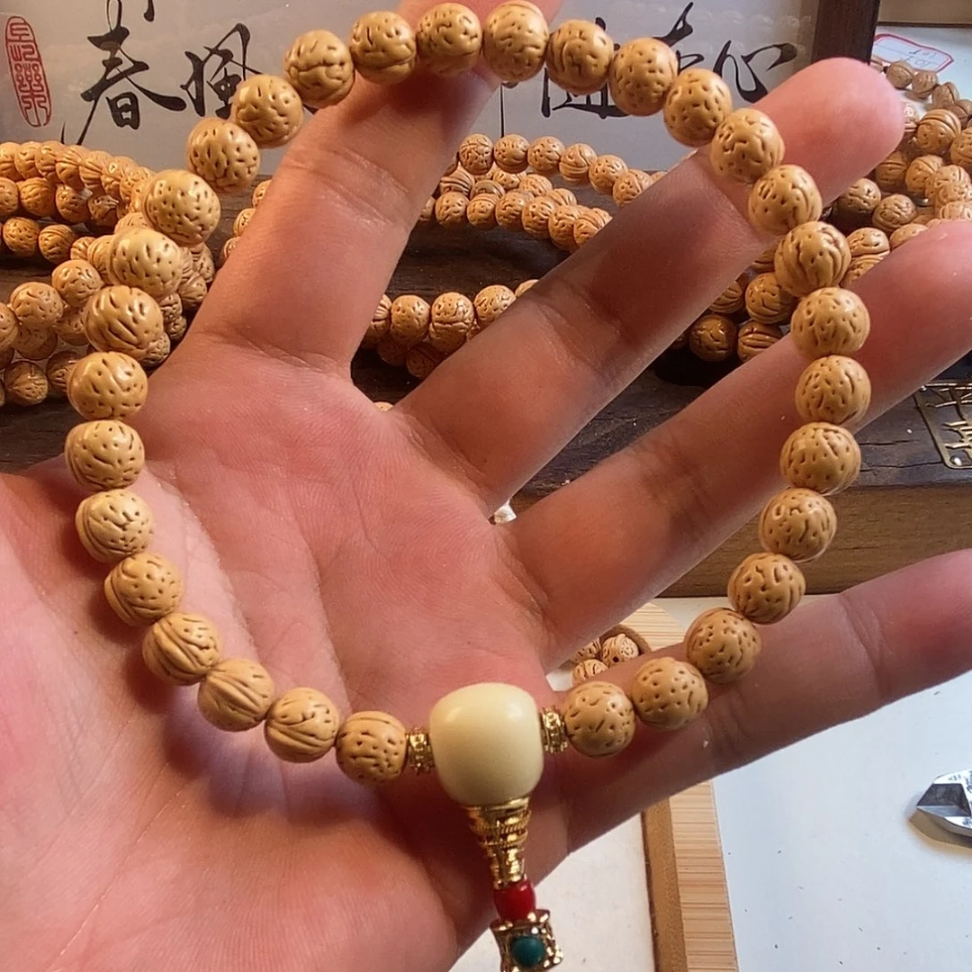花***贵吊坠桃核桃核手串