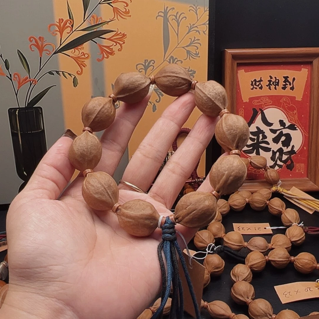 躲***蛆橄榄核手串20.26梅林铁核