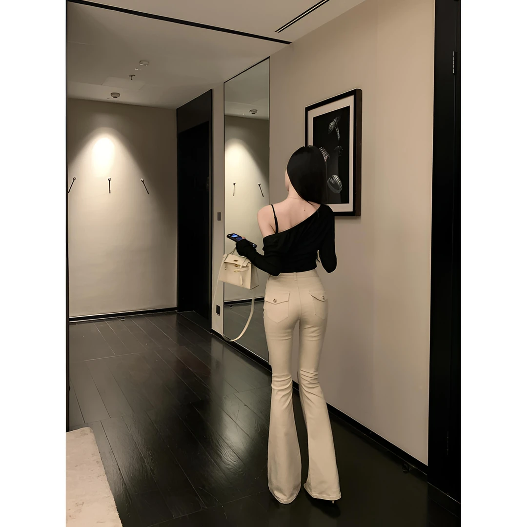 老钱风卡其色2026年春季新款修身显瘦微喇叭牛仔裤女