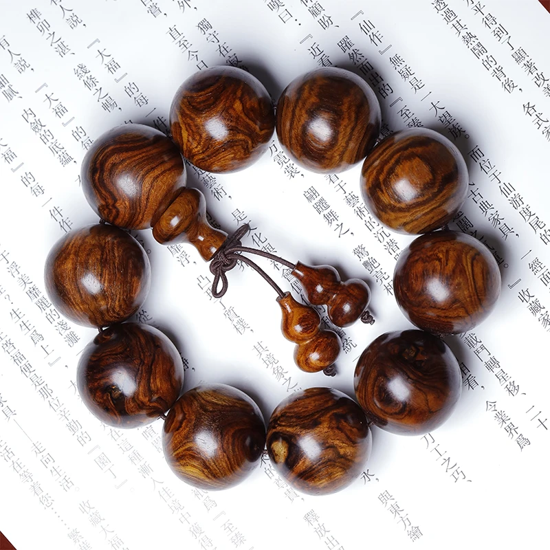 收藏级海南黄花梨对眼鬼脸25mm/10颗单圈手串千变万化BX1003HH