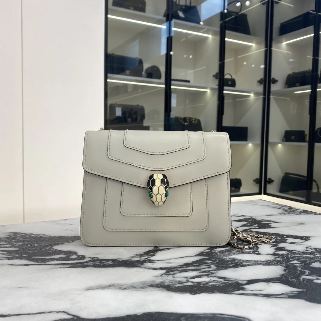 95新 BVLGARI/宝格丽 白色小号蛇头斜挎包