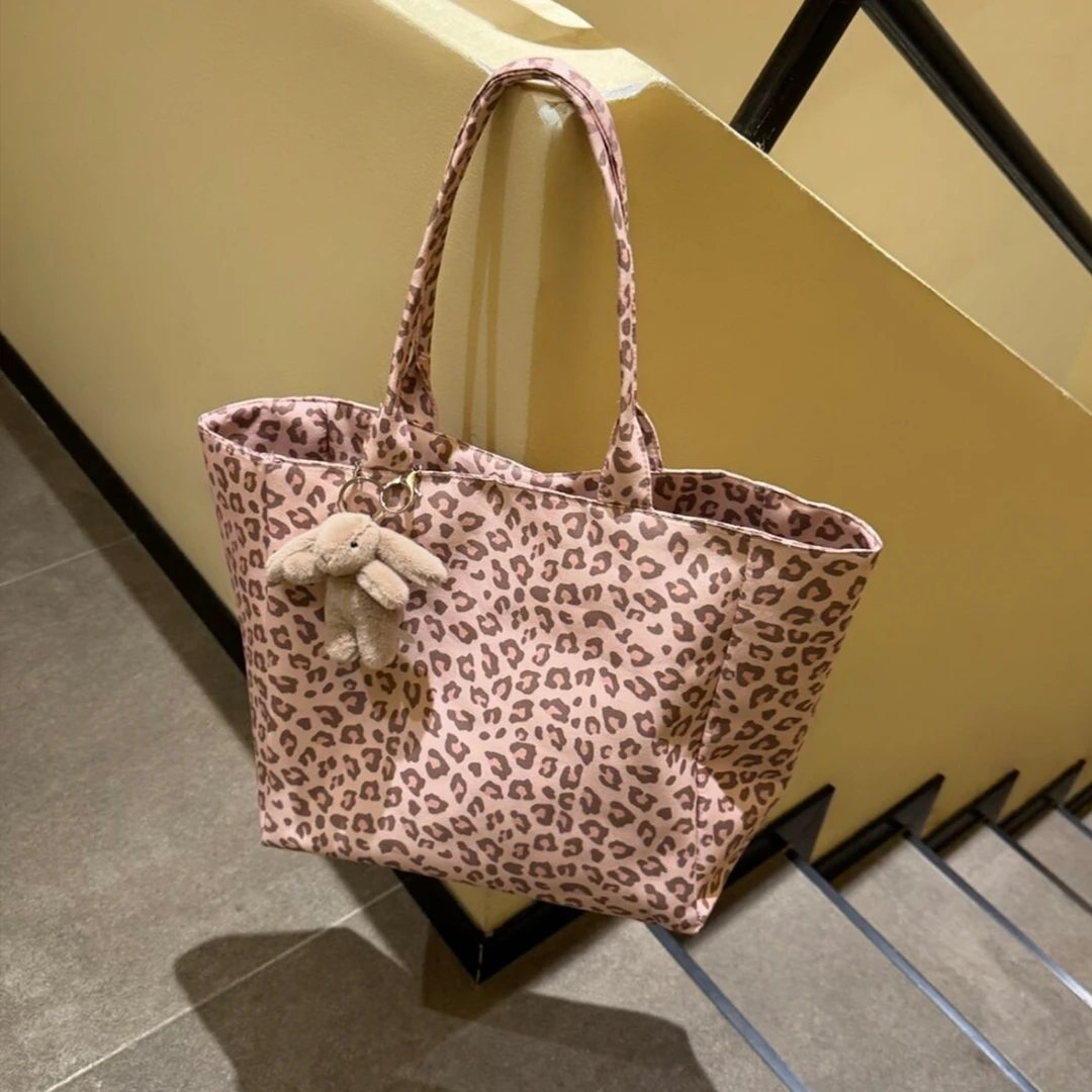 粉色豹纹帆布单肩包2025新款大容量通勤百搭时尚托特包手提购物袋