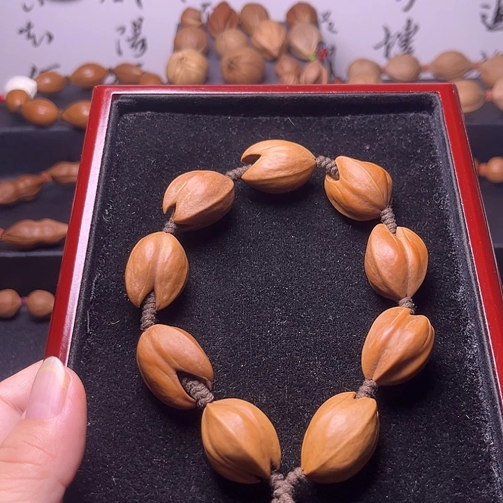橄榄核吊坠玉兰花手串