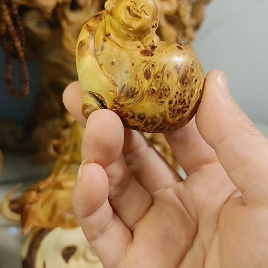 用***2柏木（崖柏）手把件笑佛