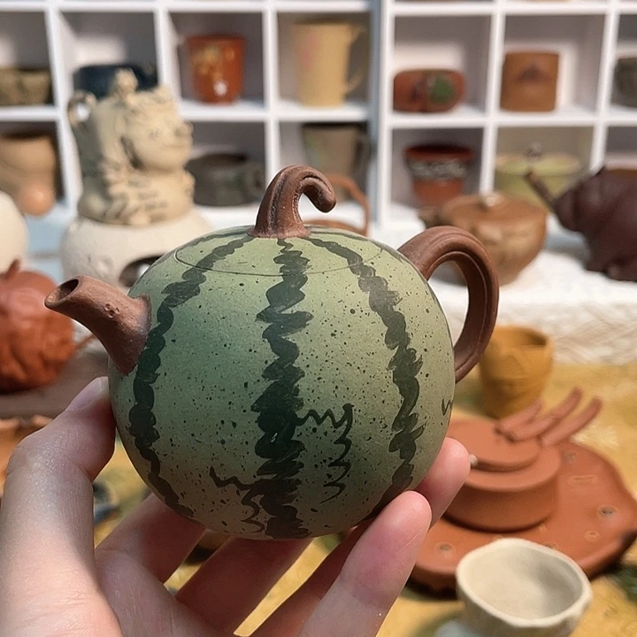 紫砂茶宠走**?西瓜紫砂壶