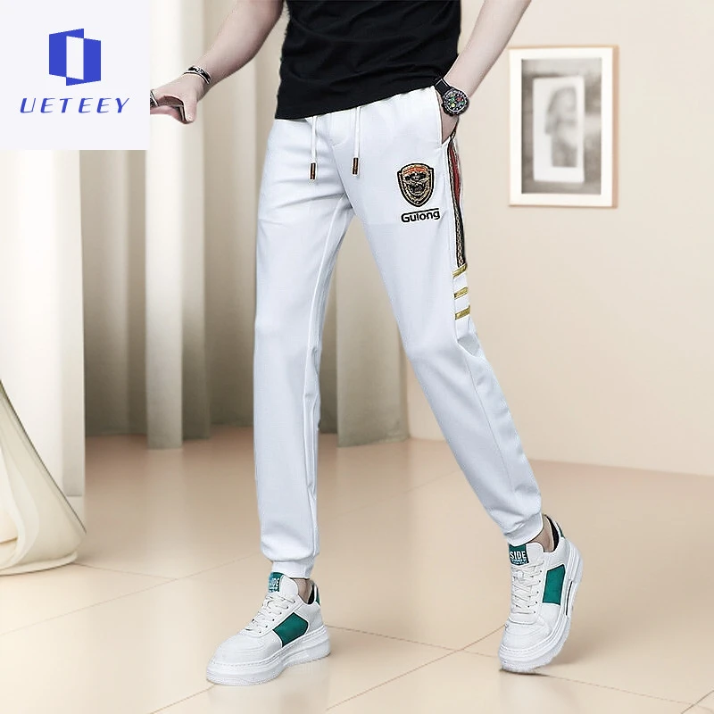 夏季宽松休闲裤男士潮流拼接束脚卫裤休闲时尚百搭轻奢痞帅男装