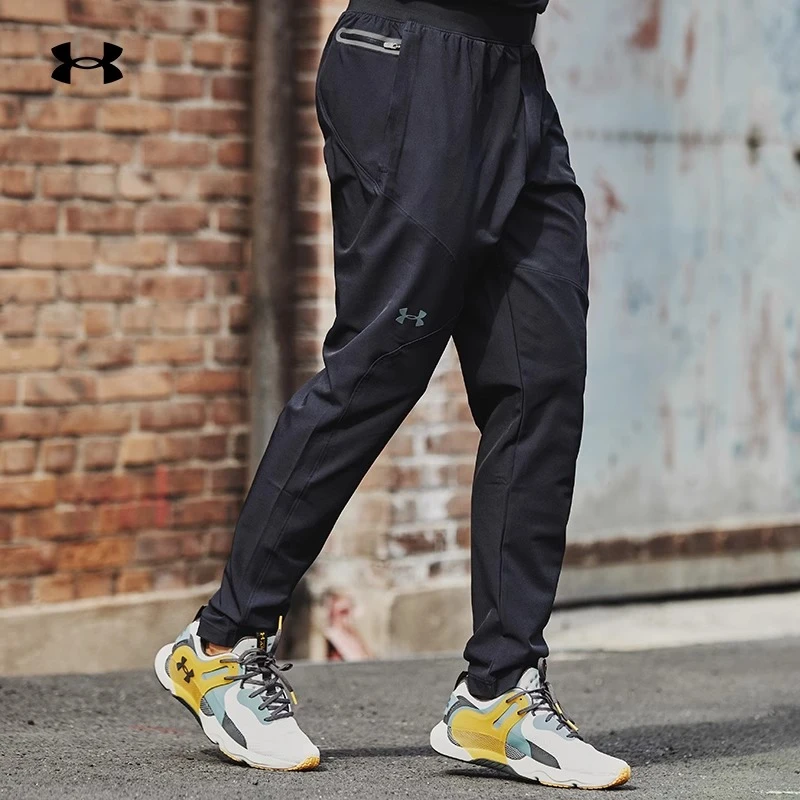 UA安德玛梭织长裤男裤2025新款户外休闲运动裤健身训练裤1352028