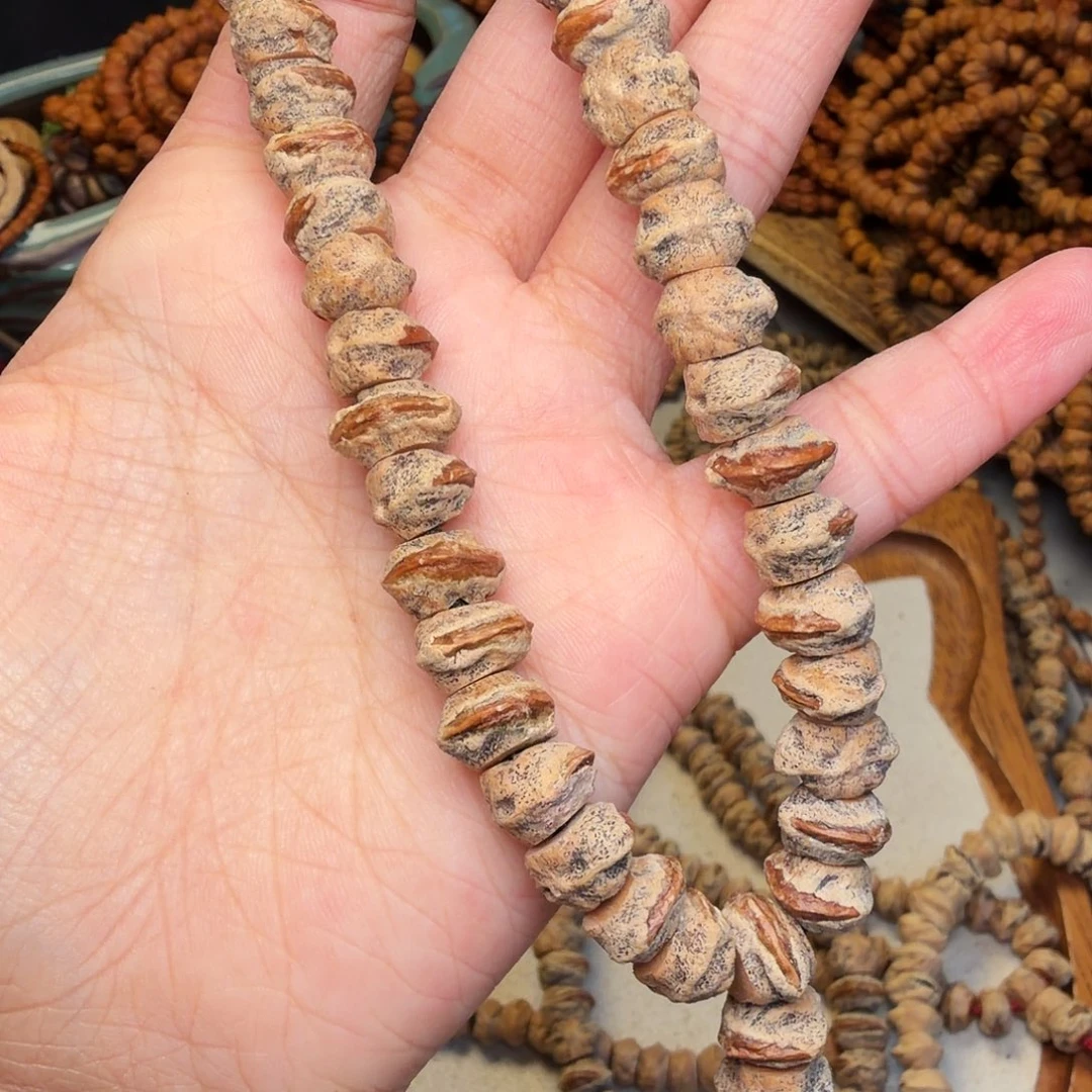 沈***九柏香籽/百香籽吊坠