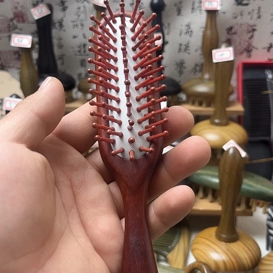 浩**贝紫檀气囊按摩梳