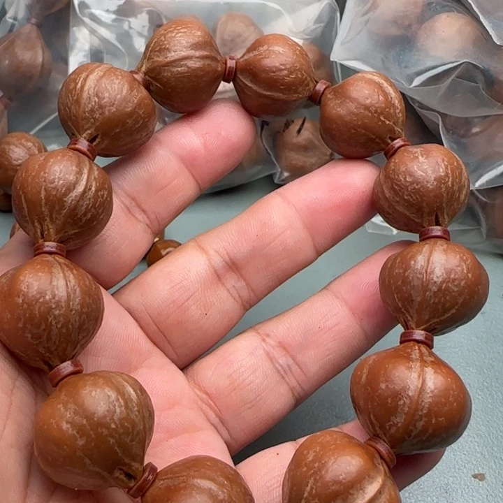 遨***游橄榄核手串橄榄核原皮铁核