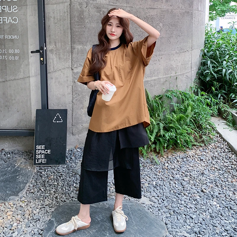 大方得体穿搭一整套撞色拼接橙色上衣网纱拼接九分阔腿裤两件套装