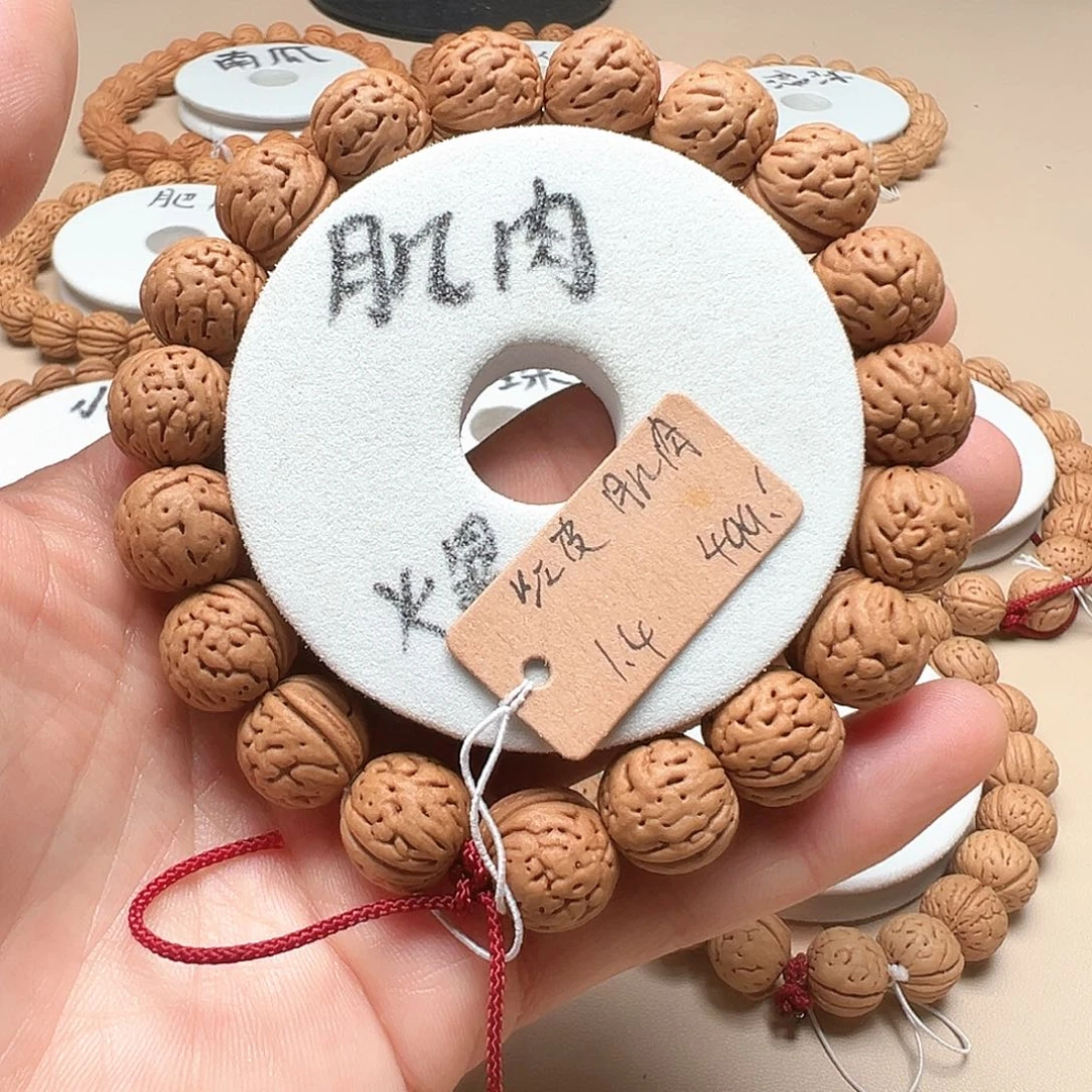 峰***疯手串桃核1.4红皮大肌肉精品