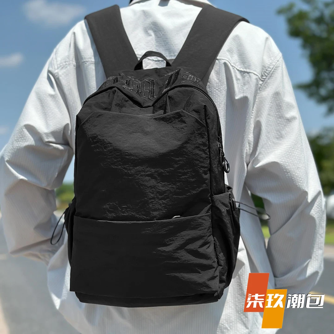 柒玖2025新款休闲潮牌双肩包户外运动旅行登山包男女学生研学书包