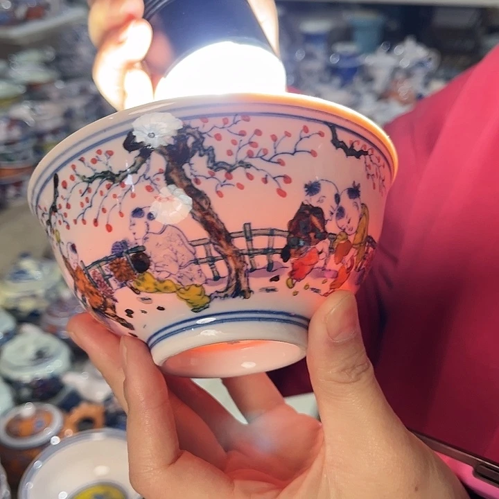 瓷片////直径12.5厘米。红西西。